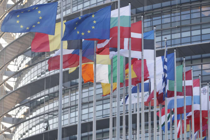 European flags are pictured outside the European Parliament Wednesday, Jan. 19, 2022 in Strasbourg, eastern France. (AP Photo/Jean-Francois Badias)
