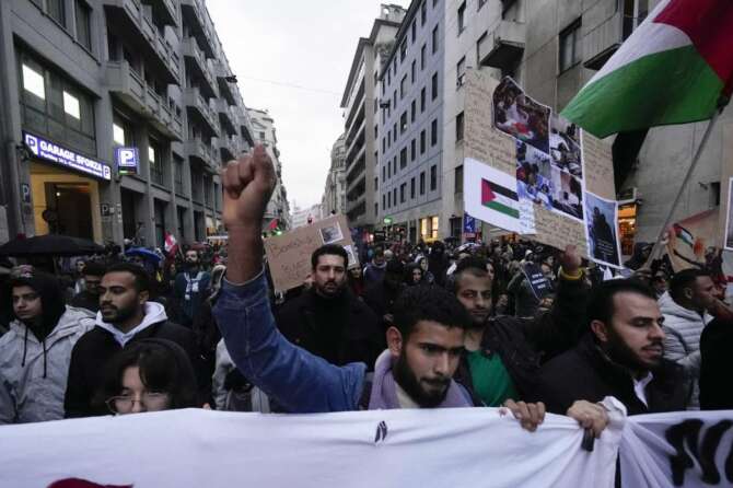 People participate in a solidarity rally for the Palestinians, in Milan, Italy, Saturday, Nov. 4, 2023. (AP Photo/Luca Bruno) Associated Press/LaPresse Only Italy and Spain
