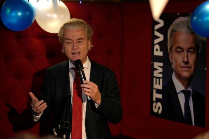 Geert Wilders, leader of the Party for Freedom, known as PVV, reacts to first preliminary results of general elections in The Hague, Netherlands, Wednesday, Nov. 22, 2023. (AP Photo/Peter Dejong)