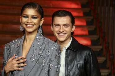 Tom Holland, right, and Zendaya pose for photographers at the photo call for the film ‘Spider-Man: No Way Home’ in London Sunday, Dec. 5, 2021. (Photo by Joel C Ryan/Invision/AP)
