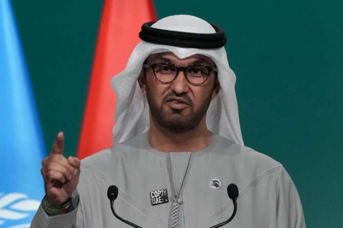 COP28 President Sultan al-Jaber speaks during a plenary session at the COP28 U.N. Climate Summit, Wednesday, Dec. 13, 2023, in Dubai, United Arab Emirates. (AP Photo/Kamran Jebreili)