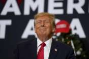 Former President Donald Trump reacts to supporters during a commit to caucus rally, Tuesday, Dec. 19, 2023, in Waterloo, Iowa. (AP Photo/Charlie Neibergall) Associated Press / LaPresse Only italy and Spain