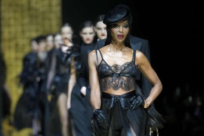 Naomi Campbell wears a creation as part of the Dolce & Gabbana women’s Fall-Winter 2024-25 collection presented in Milan, Italy, Saturday, Feb. 24, 2024. (AP Photo/Luca Bruno) Associated Press/LaPresse Only Italy and Spain