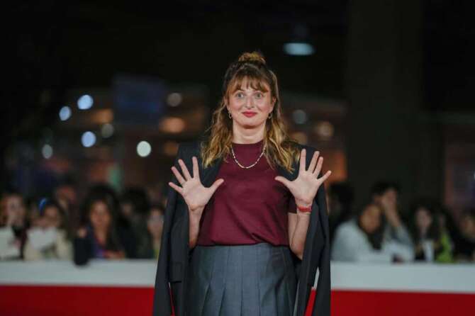 Director Alice Rohrwacher arrives on the red carpet of the film La Chimera at the 18th edition of the Rome Film Fest in Rome, Wednesday, Oct. 25, 2023. (AP Photo/Alessandra Tarantino)
