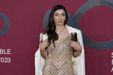 Elisabetta Franchi poses for photographers as she arrives for the CNMI sustainable fashion 2023 awards in Milan, Italy, Sunday, Sept. 24, 2023. (AP Photo/Antonio Calanni) Associated Press/LaPresse Only Italy and Spain