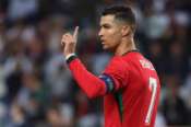 Portugal’s Cristiano Ronaldo reacts during a friendly soccer match between Portugal and Ireland at the Aveiro Municipal stadium in Aveiro, Portugal, Tuesday, June 11, 2024. (AP Photo/Luis Vieira)