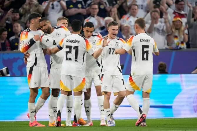 Germany’s Florian Wirtz, second right, celebrates after scoring his side’s opening goal during a Group A match between Germany and Scotland at the Euro 2024 soccer tournament in Munich, Germany, Friday, June 14, 2024. (AP Photo/Matthias Schrader) Associated Press / LaPresse Only italy and Spain