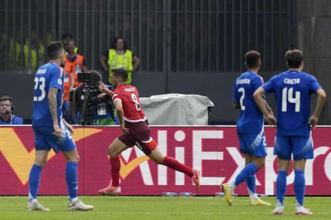 Switzerland’s Remo Freulercenter, celebrates after scoring the opening goal during a round of sixteen match between Switzerland and Italy at the Euro 2024 soccer tournament in Berlin, Germany, Saturday, June 29, 2024. (AP Photo/Antonio Calanni) Associated Press/LaPresse