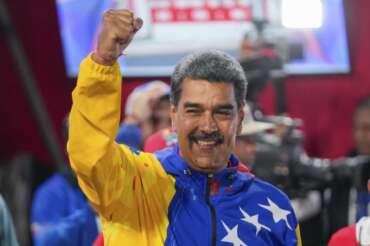 President Nicolas Maduro addressed supporters after electoral authorities declared him the winner of the presidential election in Caracas, Venezuela, Monday, July 29, 2024. (AP Photo/Fernando Vergara) Associated Press/LaPresse