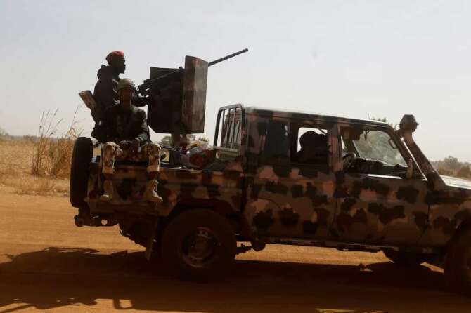 FOTO DI REPERTORIO Nigerian soldiers drive past Government Science secondary school in Kankara, Nigeria, Wednesday, Dec. 16, 2020. Rebels from the Boko Haram extremist group claimed responsibility Tuesday for abducting hundreds of boys from a school in Nigeria’s northern Katsina State last week in one of the largest such attacks in years, raising fears of a growing wave of violence in the region. (AP Photo/Sunday Alamba)