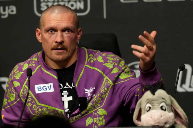 Ukraine’s boxer Oleksandr Usyk speaks at a press conference after winning his fight against Britain’s boxer Tyson Fury for the WBA, WBO, and WBC heavyweight title in Riyadh, Saudi Arabia, Sunday, Dec. 22, 2024.(AP Photo/Frank Augstein)