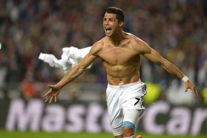 FILE – Real’s Cristiano Ronaldo, gestures, at the end of the Champions League final soccer match between Atletico Madrid and Real Madrid, at the Luz stadium, in Lisbon, Portugal, in Lisbon, Portugal, Saturday, May 24, 2014. (AP Photo/Manu Fernandez, File)