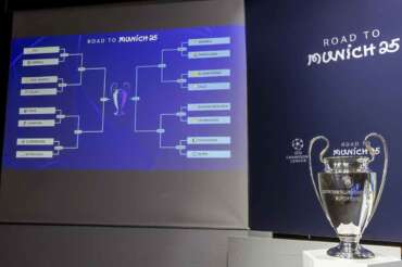 The group formations are shown on an electronic panel next to the Champions League trophy after the UEFA Champions League round of 16, quarter-final and semi-final draws, at the UEFA headquarters in Nyon, Switzerland, Friday, Feb. 21, 2025. (Salvatore Di Nolfi/Keystone via AP) Associated Press/LaPresse