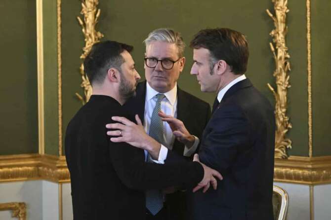 Britain’s Prime Minister Keir Starmer, center, Ukraine’s President Volodymyr Zelenskyy, left, and France’s President Emmanuel Macron meet during the European leaders’ summit to discuss Ukraine, hosted by Britain’s Prime Minister Keir Starmer, at Lancaster House, London, Sunday March 2, 2025. (Justin Tallis/Pool via AP)