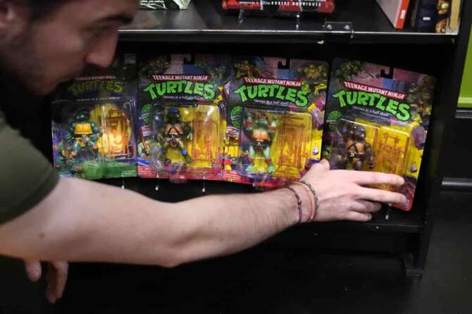 John Cookson, operations manager at the Woodman Museum, shows first edition Teenage Mutant Ninja Turtles action figures, which are part of the museum’s permanent collection, Thursday, Sept. 5, 2024, in Dover, N.H. (AP Photo/Charles Krupa)