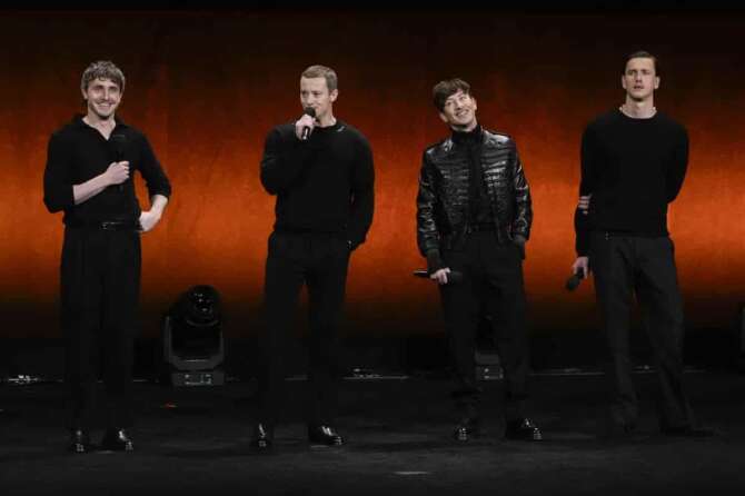 Paul Mescal, from left, Joseph Quinn, Barry Keoghan, and Harris Dickinson, cast members of the upcoming films about The Beatles, speak during the Sony Pictures presentation at CinemaCon on Monday, March 31, 2025, at Caesars Palace in Las Vegas. (AP Photo/Chris Pizzello)