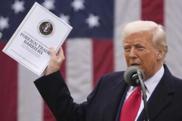 AP Photo/Mark Schiefelbein