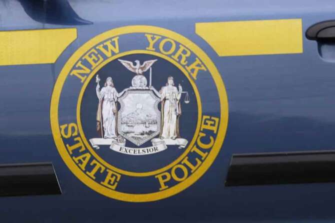 FILE – A New York State Police logo is shown on a state police officer\’s car near Dannemora, N.Y., Friday, June 12, 2015. (AP Photo/Seth Wenig, File) Associated Press / LaPresse Only italy and Spain