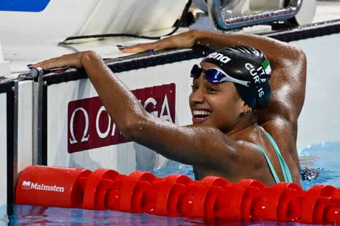 Sara Curtis reacts after team Italy won the 4×50-meter mixed freestyle relay at the World Short Course Swimming Championships in Budapest, Hungary, Friday, Dec. 13, 2024. (AP Photo/Denes Erdos)
