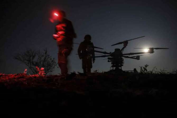 In this photo provided by Ukraine’s 24th Mechanized Brigade press service, servicemen prepare the drone “Kazhan” that delivers supply and carry heavy bombs, on the front line near Chasiv Yar town, in Donetsk region, Ukraine, Thursday, May 15, 2025. (Oleg Petrasiuk/Ukraine’s 24th Mechanized Brigade via AP)