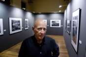 FILE – Brazilian photographer Sebastiao Salgado poses for a photo at his exhibit in the Artes e Oficios Museum of Belo Horizonte, Brazil, Oct. 26, 2006. Salgado, known for his long-term projects and images of nature and humanity, died at age 81, the Instituto Terra confirmed on Friday, May 23, 2025. (AP Photo/Eugenio Savio) Associated Press/LaPresse