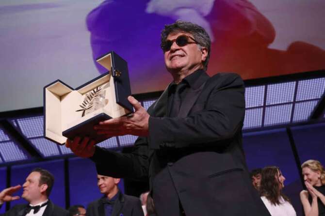 Director Jafar Panahi, accepts the Palme d’Or for the film ‘It Was Just an Accident’, during the awards ceremony of the 78th international film festival, Cannes, southern France, Saturday, May 24, 2025. (Photo by Joel C Ryan/Invision/AP)