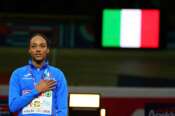 Gold medalist Italy’s Larissa Iapichino celebrates on the podium for the Women’s Long Jump during the European Athletics Indoor Championships in Apeldoorn, Netherlands, Sunday, March 9, 2025. (AP Photo/Peter Dejong)