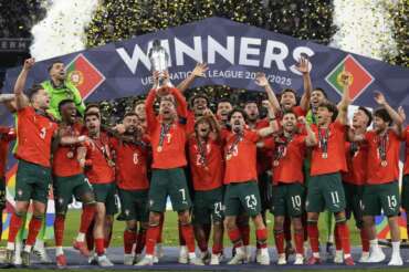 Portugal’s Cristiano Ronaldo celebrates with teammates after winning the Nations League final soccer match between Portugal and Spain at the Allianz Arena in Munich, Germany, Monday, June 9, 2025. (AP Photo/Matthias Schrader)