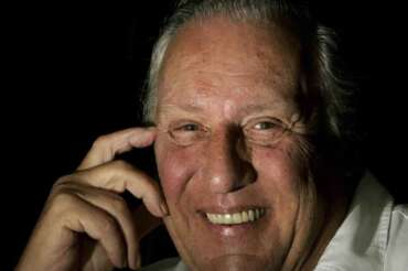 FILE – British author Frederick Forsyth poses for a photograph in Hertford, England, Aug. 17, 2006. (AP Photo/Kirsty Wigglesworth, File)
