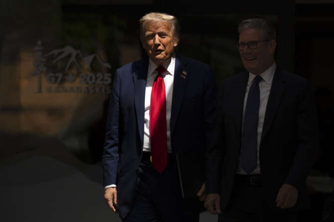 AP Photo/Mark Schiefelbein