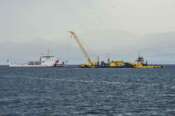 FILE – Italian Coast Guard’s Luigi Dattilo patrol boat, left, assists the multi-purpose floating work barge Hebo Lift 2 monitoring the stretch of sea off Porticello, near Palermo, Sicily, Italy, Sunday, May 4, 2025, where the British superyacht Bayesian sunk on August 19, 2024 as the operations for its recovery start. (AP Photo/Salvatore Cavalli, File)