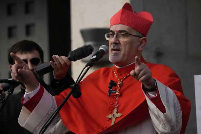 Latin Patriarch Pierbattista Pizzaballa, the top Catholic clergyman in the Holy Land, gives a speech as he arrives at the Church of the Nativity, traditionally believed to be the birthplace of Jesus, on Christmas Eve in the West Bank city of Bethlehem, Tuesday, Dec. 24, 2024. (AP Photo/Matias Delacroix) Associated Press/LaPresse