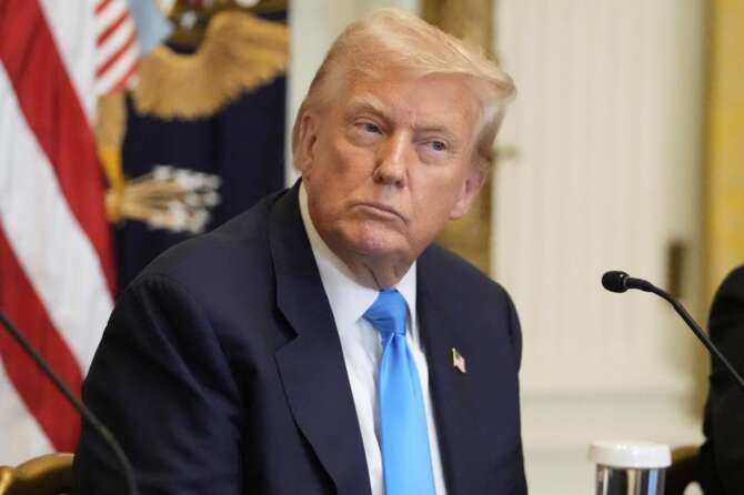 AP Photo/Mark Schiefelbein