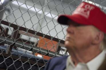 President Donald Trump tours “Alligator Alcatraz,” a new migrant detention facility at Dade-Collier Training and Transition facility, Tuesday, July 1, 2025, in Ochopee, Fla. (AP Photo/Evan Vucci)