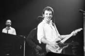 Bruce Springsteen, on stage at the Palais des Sports in Saint-Ouen-Sur-Seine, France, where the first concert of his French tour attracted a large crowd on April 19, 1981. (AP Photo/Jacques Langevin)
