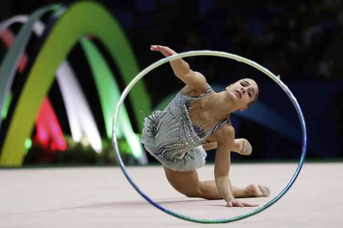 Italy’s Sofia Raffaeli competes with the hoop during the individual apparatus final at the 41st FIG Rhythmic Gymnastics World Championships at Carioca Arena, in Rio de Janeiro, Sunday, Aug. 24, 2025. (AP Photo/Bruna Prado) Associated Press / LaPresse Only italy and spain