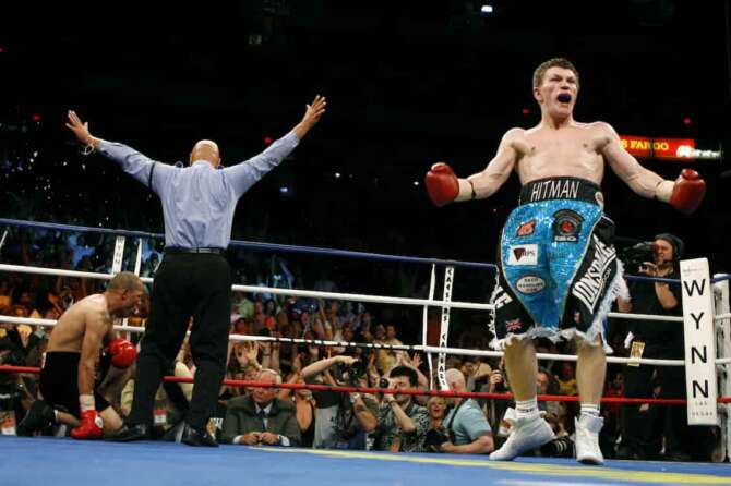 FILE – Ricky Hatton right, of Manchester, England, celebrates a fourth-round knockout over Jose Luis Castillo, left, during their IBO junior welterweight championship boxing match at the Thomas and Mack Center in Las Vegas, Saturday, June 23, 2007. Hatton was elected Thursday, Dec. 7, 2023 to the International Boxing Hall of Fame. (AP Photo/Eric Jamison, File)