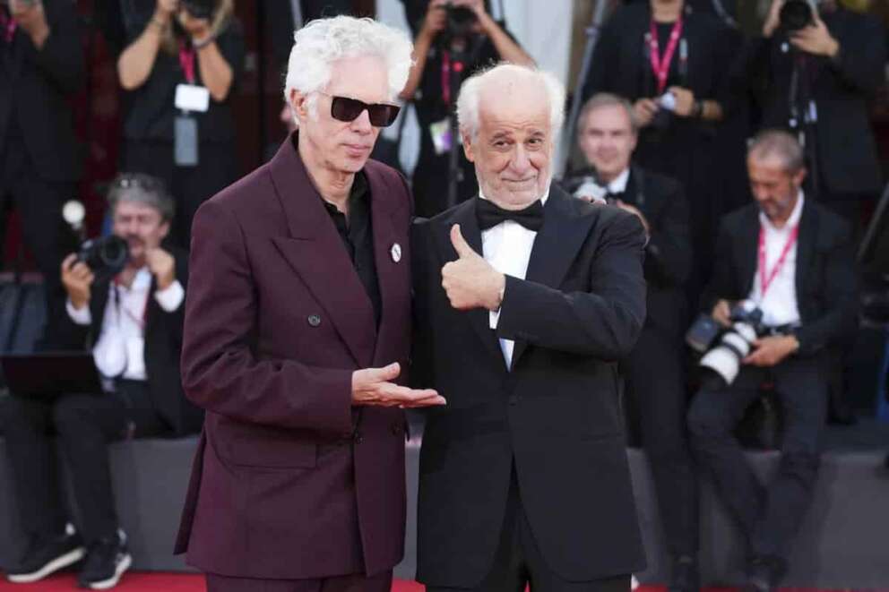 Jim Jarmusch, left, and Toni Servillo pose for photographers upon arrival at the awards ceremony of the 82nd edition of the Venice Film Festival in Venice, Italy, on Saturday, Sept. 6, 2025. (Photo by Scott A Garfitt/Invision/AP)