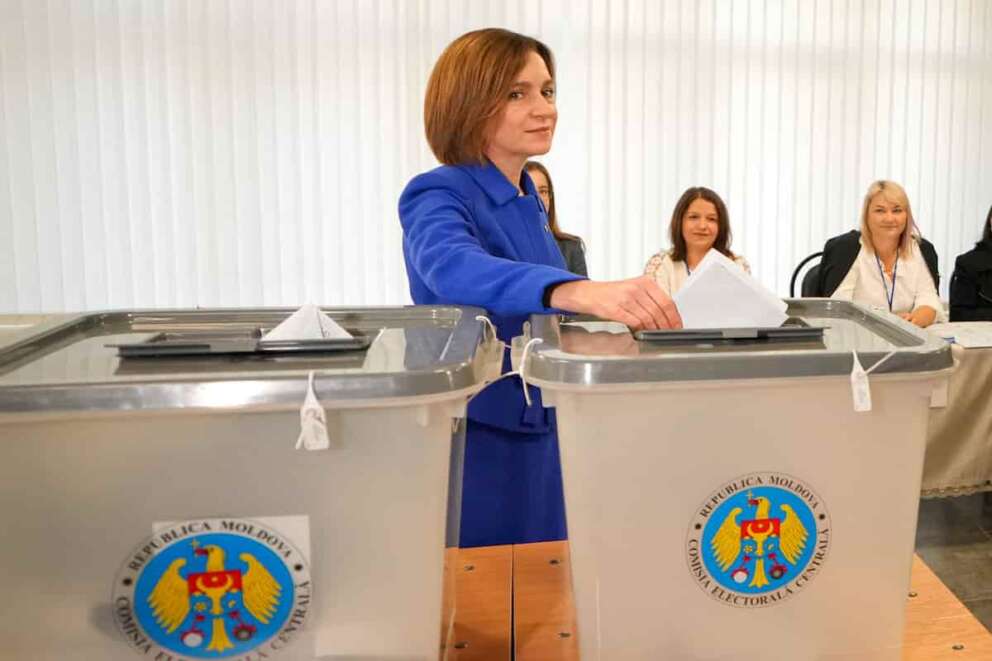 Moldova’s President Maia Sandu casts her vote during a parliamentary election, in Chisinau, Moldova, Sunday, Sept. 28, 2025. (AP Photo/Vadim Ghirda)