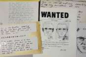 FILE – In this May 3, 2018, file photo, a San Francisco Police Department wanted bulletin and copies of letters sent to the San Francisco Chronicle by a man who called himself Zodiac are displayed in San Francisco. A coded letter mailed to a San Francisco newspaper by the Zodiac serial killer in 1969 has been deciphered by a team of amateur sleuths from the United States, Australia and Belgium, the San Francisco Chronicle reported Friday, Dec. 11, 2020. (AP Photo/Eric Risberg, File)