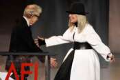 FILE – Filmmaker Woody Allen, left, greets actress Diane Keaton onstage to present her with the 45th AFI Life Achievement Award on June 8, 2017, in Los Angeles. (Photo by Chris Pizzello/Invision/AP, File) Associated Press / LaPresse Only italy and spain