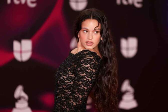 FILE – Rosalia arrives at the 24th annual Latin Grammy Awards in Seville, Spain, Nov. 16, 2023. (Photo by Vianney Le Caer/Invision/AP, File)