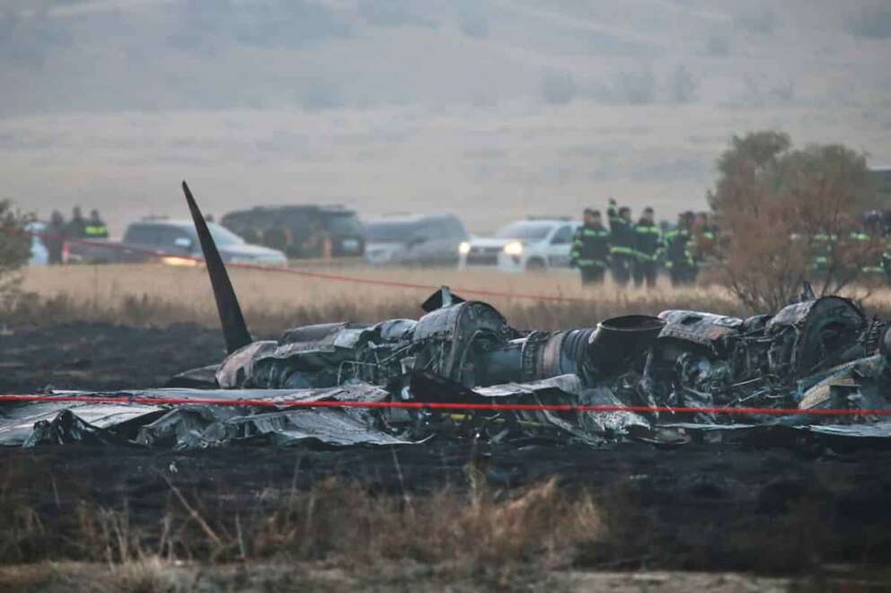 Debris is seen at a crash site of a Turkish military cargo plane in Georgia’s Sighnaghi municipality, close to the Azerbaijani border on Wednesday, Nov. 12, 2025. (AP Photo/Zurab Tsertsvadze)