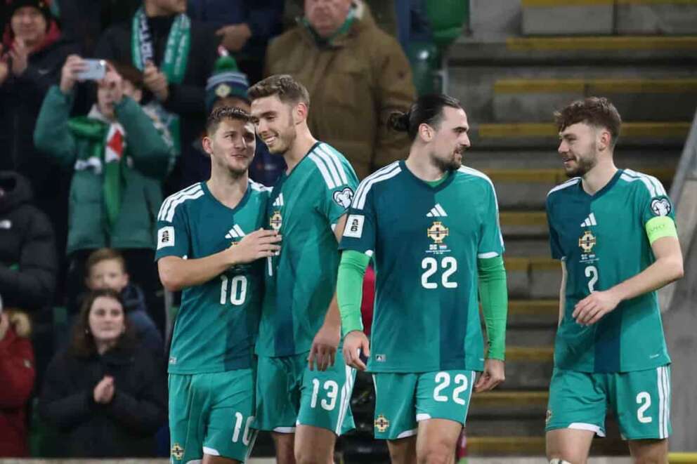 Northern Ireland’s Jamie Donley, left, celebrates with teammates after scoring the opening goal during the 2026 World Cup group A qualifying soccer match between Northern Ireland and Luxembourg, in Belfast, Northern Ireland, Monday, Nov. 17, 2025. (AP Photo/Peter Morrison)