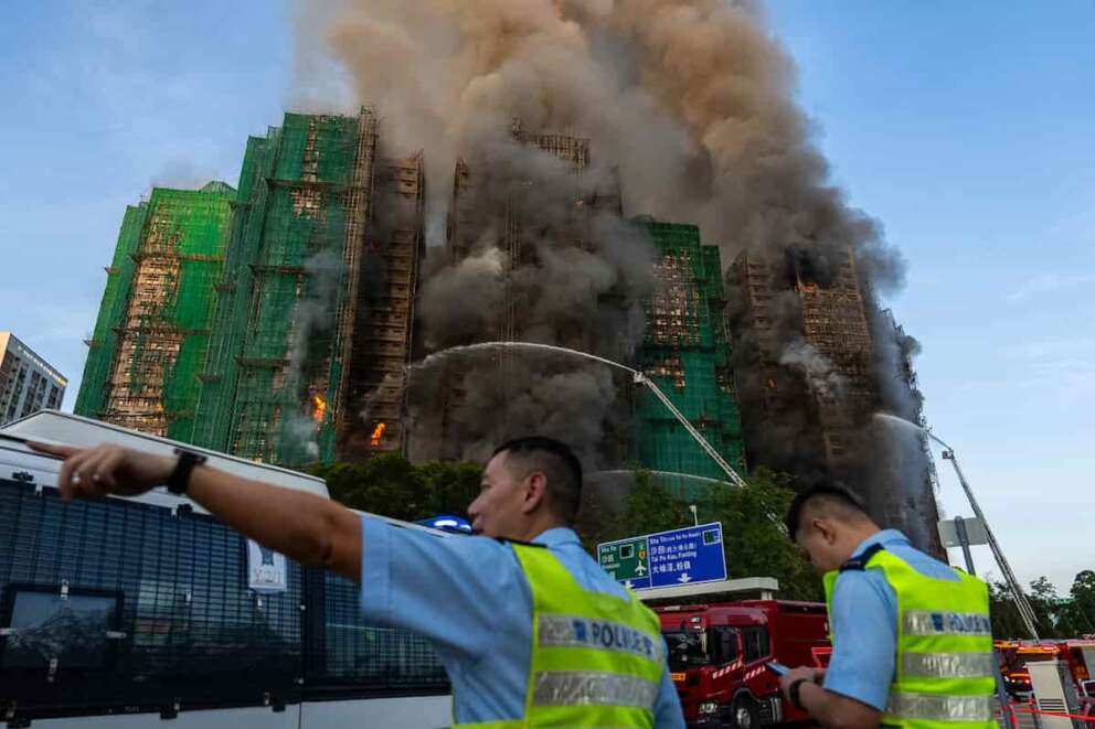 First responders work the scene of a fire at Wang Fuk Court, a residential estate in the Tai Po district of Hong Kong’s New Territories on Wednesday, Nov. 26 2025. (AP Photo/Chan Long Hei)