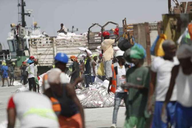 FILE – Workers offload goods from a docked ship at the seaport of Berbera in Somaliland, a breakaway region of Somalia, on Feb. 10, 2022. The leader of Somaliland urged the international community on Monday, March 14 to recognize his territory’s quest for independence, saying negotiations with Somalia had failed. (AP Photo/Brian Inganga, File)