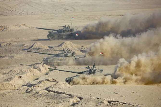 FOTO DI REPERTORIO FILE – Tajikistan’s tanks roll during a joint military drills by Russia and Uzbekistan at Harb-Maidon firing range about 20 kilometers (about 12 miles) north of the Tajik border with Afghanistan, in Tajikistan, Tuesday, Aug. 10, 2021. The four men charged with the massacre at a Moscow theater have been identified by the Russian government as citizens of Tajikistan, some of the thousands who migrate each year from the poorest of the former Soviet republics to scrape out marginal existences. (AP Photo/Didor Sadulloev, File)
