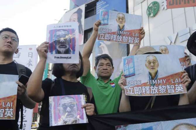 Hong Kong activists and supporters in Taiwan gather to support imprisoned Hong Kong activist publisher Jimmy Lai for the national security trial in Taipei, Taiwan, Sunday, Aug. 24, 2025. (AP Photo/Chiang Ying-ying)