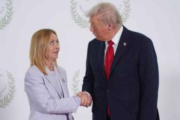 President Donald Trump greets Italy’s Prime Minister Giorgia Meloni during summit to support ending the more than two-year Israel-Hamas war in Gaza after a breakthrough ceasefire deal, Monday, Oct. 13, 2025, in Sharm El Sheikh, Egypt. (AP Photo/Evan Vucci, Pool)