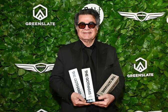 Jafar Panahi poses with the awards for best international feature, best original screenplay and best director at The Gotham Film Awards at Cipriani Wall Street on Monday, Dec. 1, 2025, in New York. (Photo by Evan Agostini/Invision/AP) Associated Press 7 LaPresse Only italy and spain